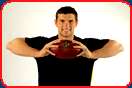 andrew luck squeezes football