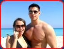 bodybuilder beach sunglasses girlfriend
